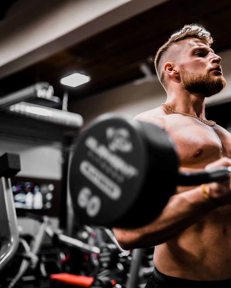 Packed HIIT conditioning class mid-burpee